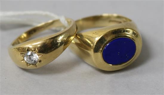 A 9ct gold and lapis lazuli ring and a 9ct gold gypsy set ring.